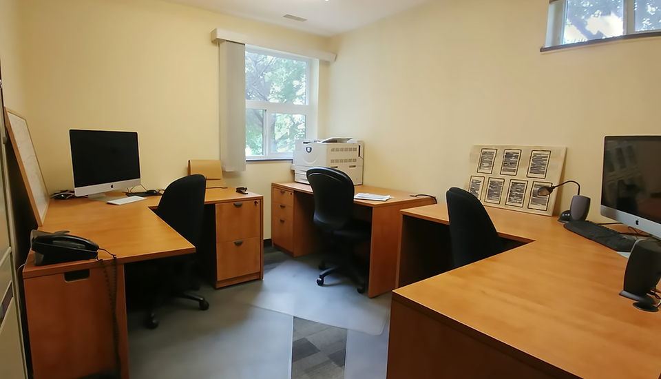 Chronicle office with multiple desk work space for its editors.