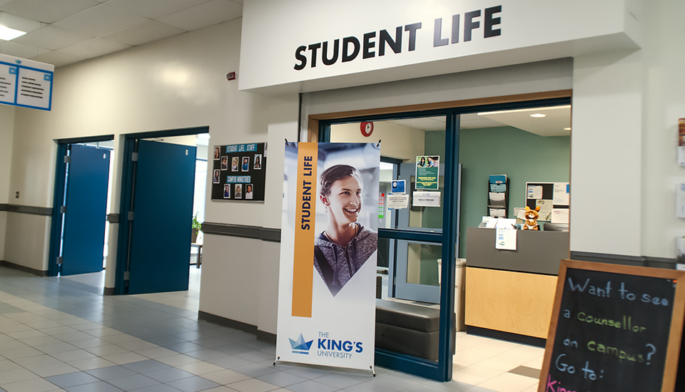 Entrance to the student life hallway with the student life office to the right.