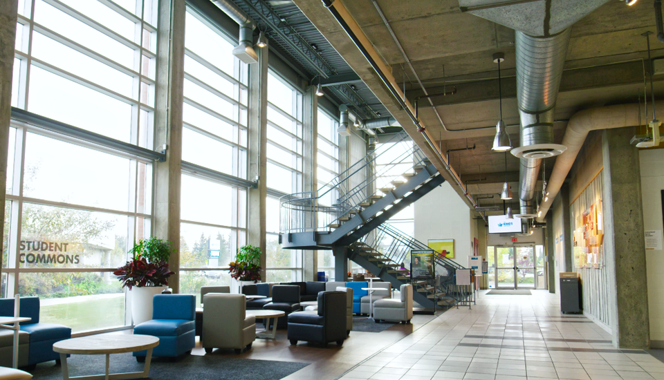 Large floor to ceiling windows in the Alumni Lounge.