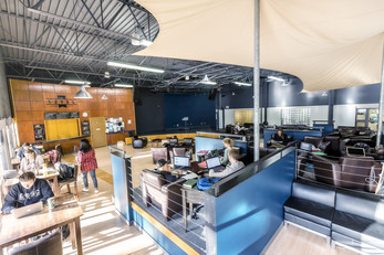 Rent the Level Coffee House, this multi -purpose room has beautiful hardwood floors, leather furniture and a stage.