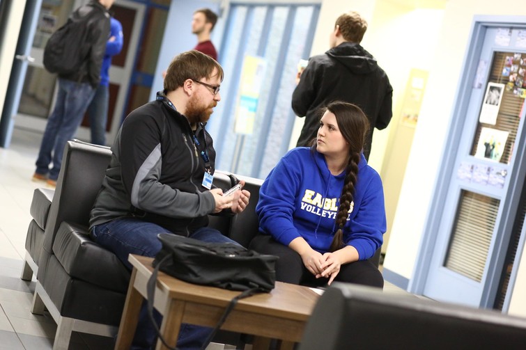 Women Volleyball captain Lauren Jensen interviews with a member of the Media
