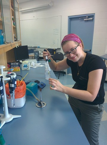 Kaitlyn working in the lab 