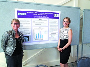 Executive Director Sue Huff with student Milena Miller at poster presentation, Pscyhologist's Association of Alberta Spring 2017.